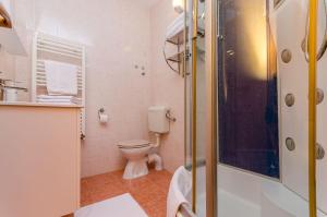 Kúpeľňa v ubytovaní Apartment Benzon