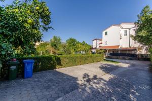 Vonkajšia záhrada v ubytovaní Apartment Benzon