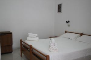 Postel nebo postele na pokoji v ubytování Hotel Europa