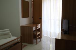 TV a/nebo společenská místnost v ubytování Hotel Europa