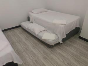 Postel nebo postele na pokoji v ubytování Villa Aurora