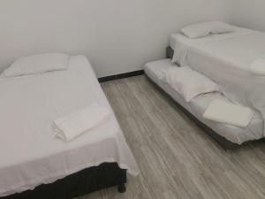 Postel nebo postele na pokoji v ubytování Villa Aurora