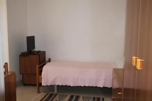 Postel nebo postele na pokoji v ubytování Hotel Europa