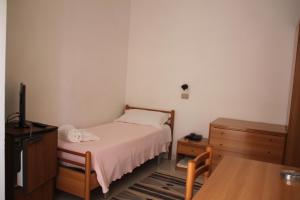 Postel nebo postele na pokoji v ubytování Hotel Europa