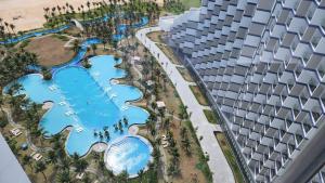 an aerial view of the pool at a resort at Apartment Cam Ranh in Thôn Hòa Ða