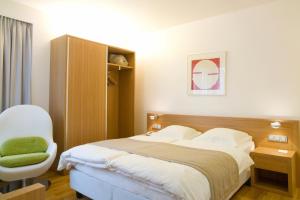 Ένα ή περισσότερα κρεβάτια σε δωμάτιο στο Hotel Simoncini