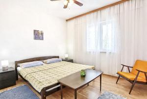 Posteľ alebo postele v izbe v ubytovaní Apartments Ziva - by the beach;