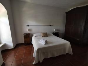 Postel nebo postele na pokoji v ubytování Masseria Tarantini