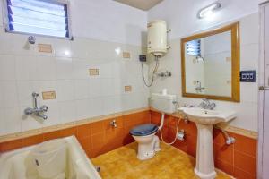 Phòng tắm tại Ayushman Hotels