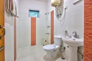 Phòng tắm tại Ayushman Hotels