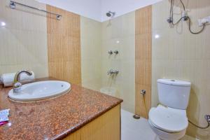 Phòng tắm tại Ayushman Hotels