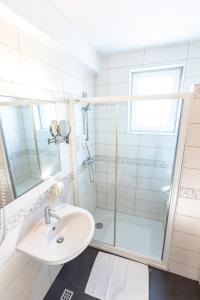 Kopalnica v nastanitvi Hotel Bau Maribor