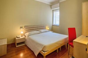 Posteľ alebo postele v izbe v ubytovaní Hotel Calypso