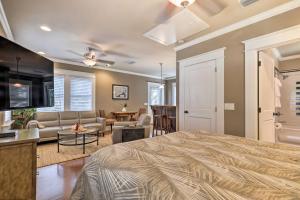 a bedroom with a bed and a living room at Hyde Park Luxury Studio with Prime Location! in Tampa