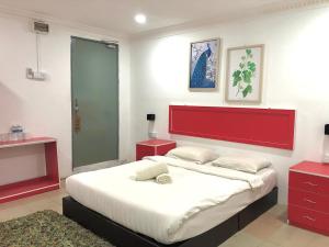Voodi või voodid majutusasutuse Green Town Hotel And Resort toas