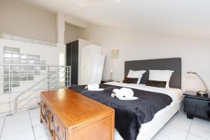 Posteľ alebo postele v izbe v ubytovaní Aya's Duplex YourHostHelper + 4 fotografie