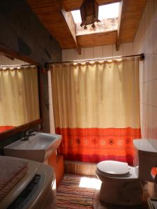 Um banheiro em Cabaña Media Luna