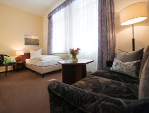 Postel nebo postele na pokoji v ubytování Villa Neptun