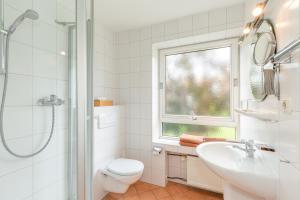 Koupelna v ubytování Gästehaus Menkenbauer + 37 fotografií