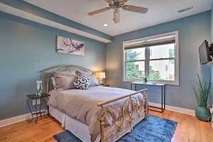 a bedroom with a bed and a ceiling fan at Chic Philly Townhome Less Than 3 Mi to Center City! in Philadelphia