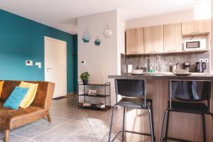 Kuchyňa alebo kuchynka v ubytovaní Superbe Appartement Terrasse RDC - NEW LOCATION