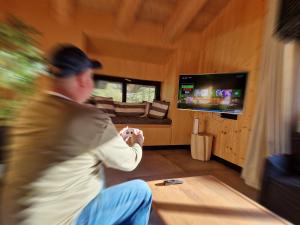 TV a/nebo společenská místnost v ubytování Chalet One Jasná