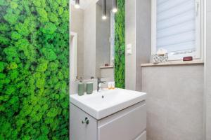 Kúpeľňa v ubytovaní Kraków Trendy Studio Apartments by Noclegi Renters