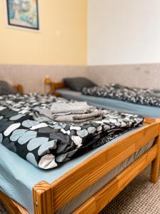 two beds in a room with at JP ubytování Loštice in Loštice