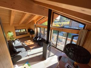 Posezení v ubytování Chalet One Jasná