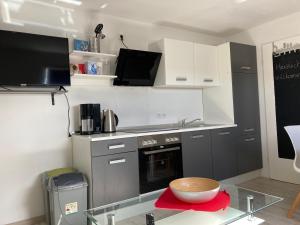 Kuchyň nebo kuchyňský kout v ubytování Ferienwohnung Lopperland in Hinte