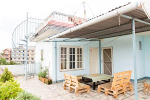 Balkón nebo terasa v ubytování Ananda Tree House Eco Homestay