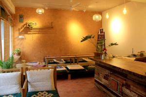 Posezení v ubytování Ananda Tree House Eco Homestay