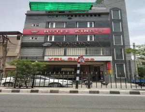 a building with a hotel kings seasons sign on it at Hotel Kings, Rohtak in Rohtak