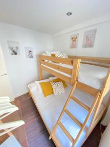 A bed or beds in a room at Alojamientos Rías Baixas- Casa Castillejos- Carril