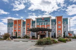 a rendering of a hotel in a parking lot at Best Western Plus North Odessa Inn & Suites in Odessa