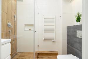 Kúpeľňa v ubytovaní Kraków Trendy Studio Apartments by Noclegi Renters