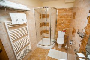 Koupelna v ubytování Hotel Boss