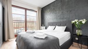 Posteľ alebo postele v izbe v ubytovaní Apartments Jaglana with Parking & SPA