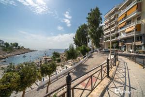 a view of a river from a building at La Mer Apartment by LobbySquare in Piraeus
