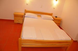 Posteľ alebo postele v izbe v ubytovaní Chalikias Rooms