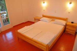 Posteľ alebo postele v izbe v ubytovaní Chalikias Rooms