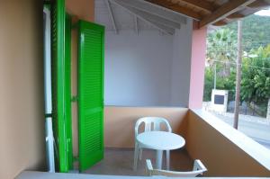Fotografia z galérie ubytovania Chalikias Rooms v destinácii Asprogerakata