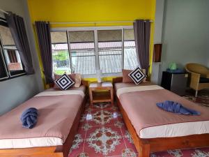 Postel nebo postele na pokoji v ubytování Sleep Pai Bed & Breakfast