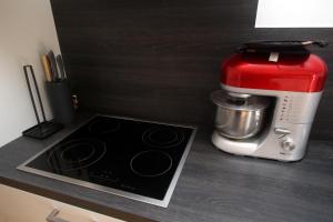 Kuchyň nebo kuchyňský kout v ubytování Chambre d'hôte Blankenberge