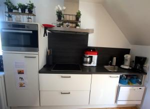 Kuchyň nebo kuchyňský kout v ubytování Chambre d'hôte Blankenberge