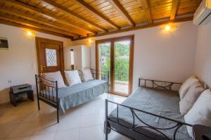 Posteľ alebo postele v izbe v ubytovaní Villa Louisa