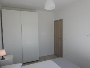 Postel nebo postele na pokoji v ubytování Apartment Salvia