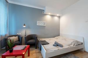 Posteľ alebo postele v izbe v ubytovaní Cosy Studio in University District-Free Parking with gate!