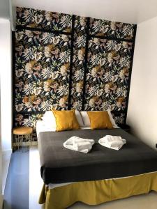 A bed or beds in a room at New Vite Apartment