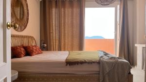 Posteľ alebo postele v izbe v ubytovaní Casa Chillout